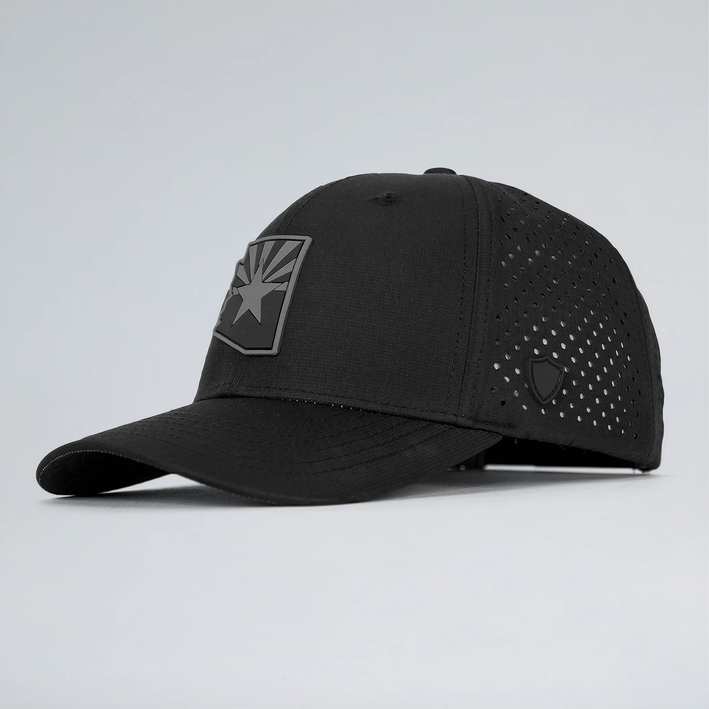 Black cap with a star emblem on a light gray background