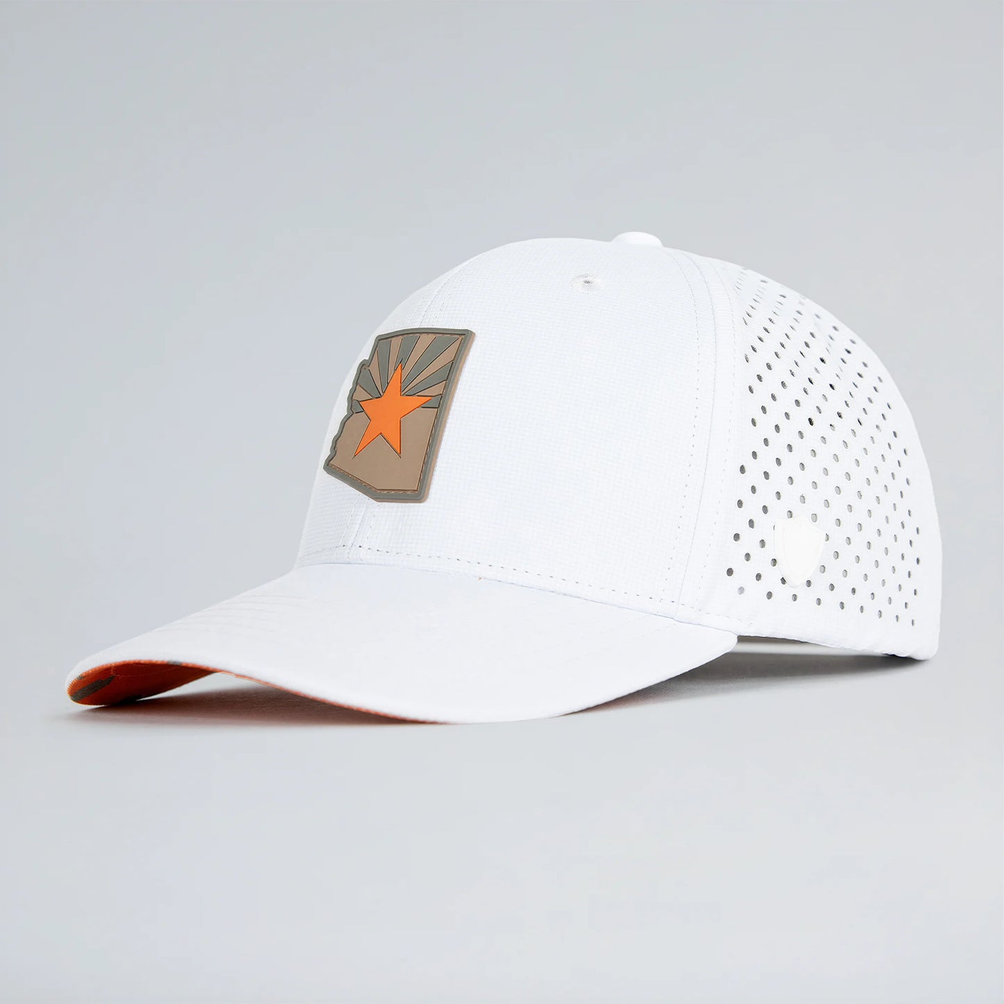 White baseball cap with a star emblem on a gray background