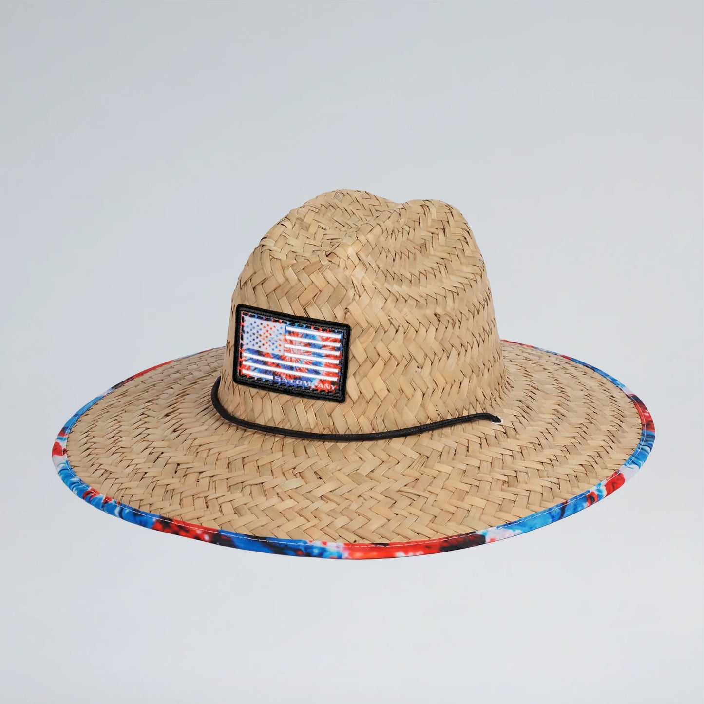 Straw hat with American flag patch on a light gray background