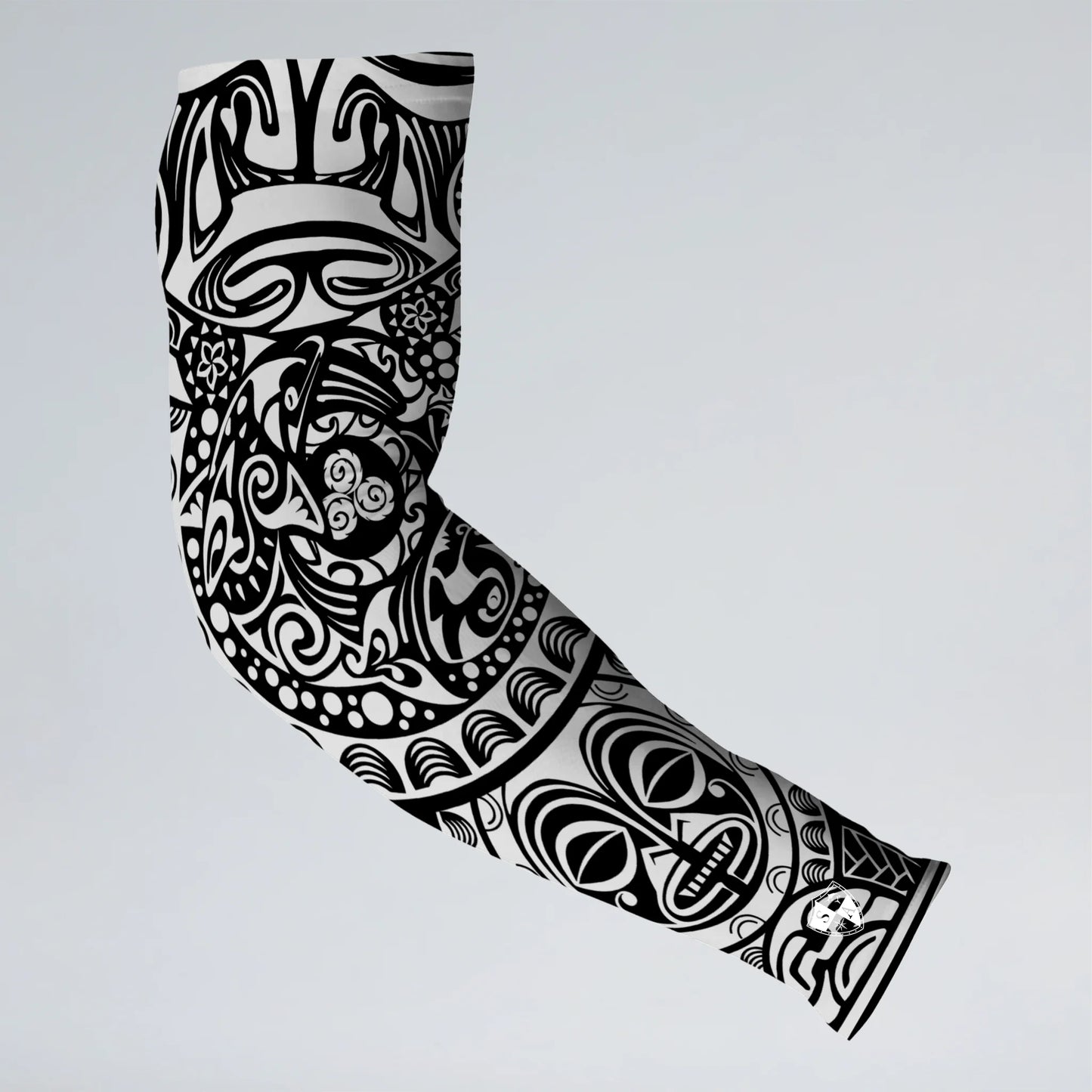 Black and white tattoo-style arm sleeve on a light gray background