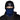 Man wearing a navy fleece neck gaiter pulled over his face with a black beanie