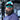 Angler on a boat wearing the Fintech United By Fishing snapback