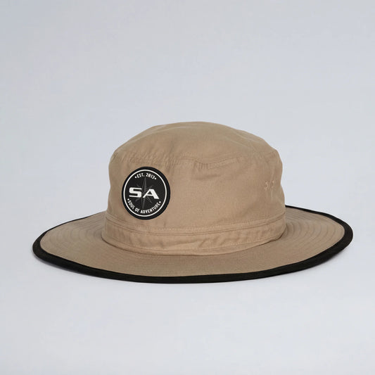 Beige bucket hat with a logo on a white background