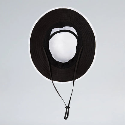 Black wide-brimmed hat with a strap on a light gray background