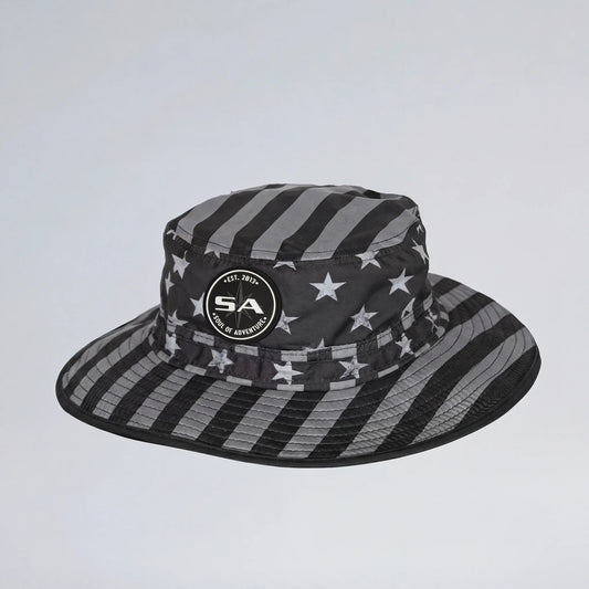 Black and gray striped bucket hat with star pattern on a light gray background