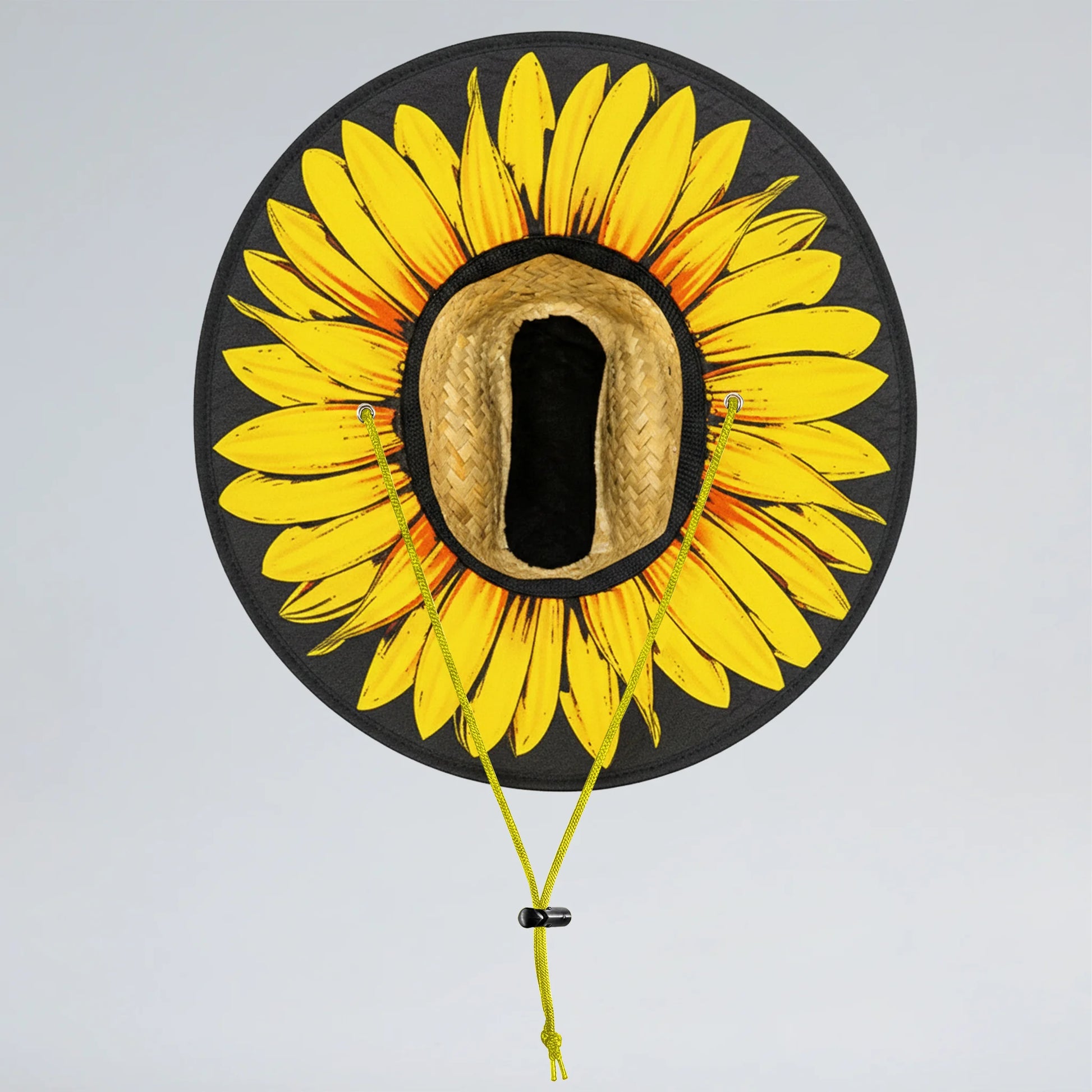 Decorative item with a sunflower design on a black background