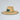 Straw hat with a logo on a light gray background