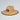 Straw hat with a logo on a light gray background
