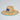Straw hat with a blue band and logo on a light gray background