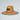 Straw hat with a logo on a light gray background