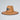 Straw hat with a logo on a light gray background