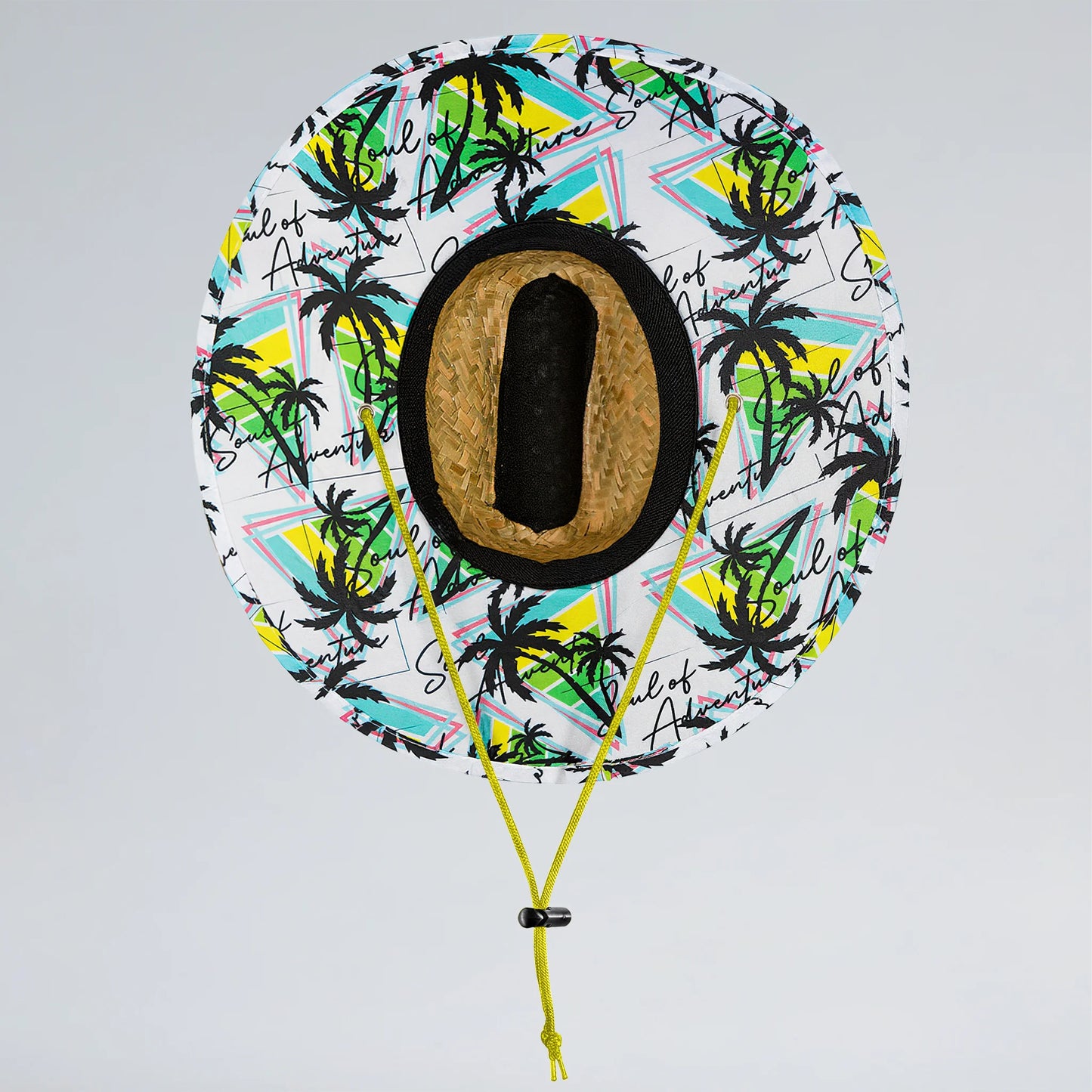 Decorative balloon with palm tree pattern and number '0' on a light gray background