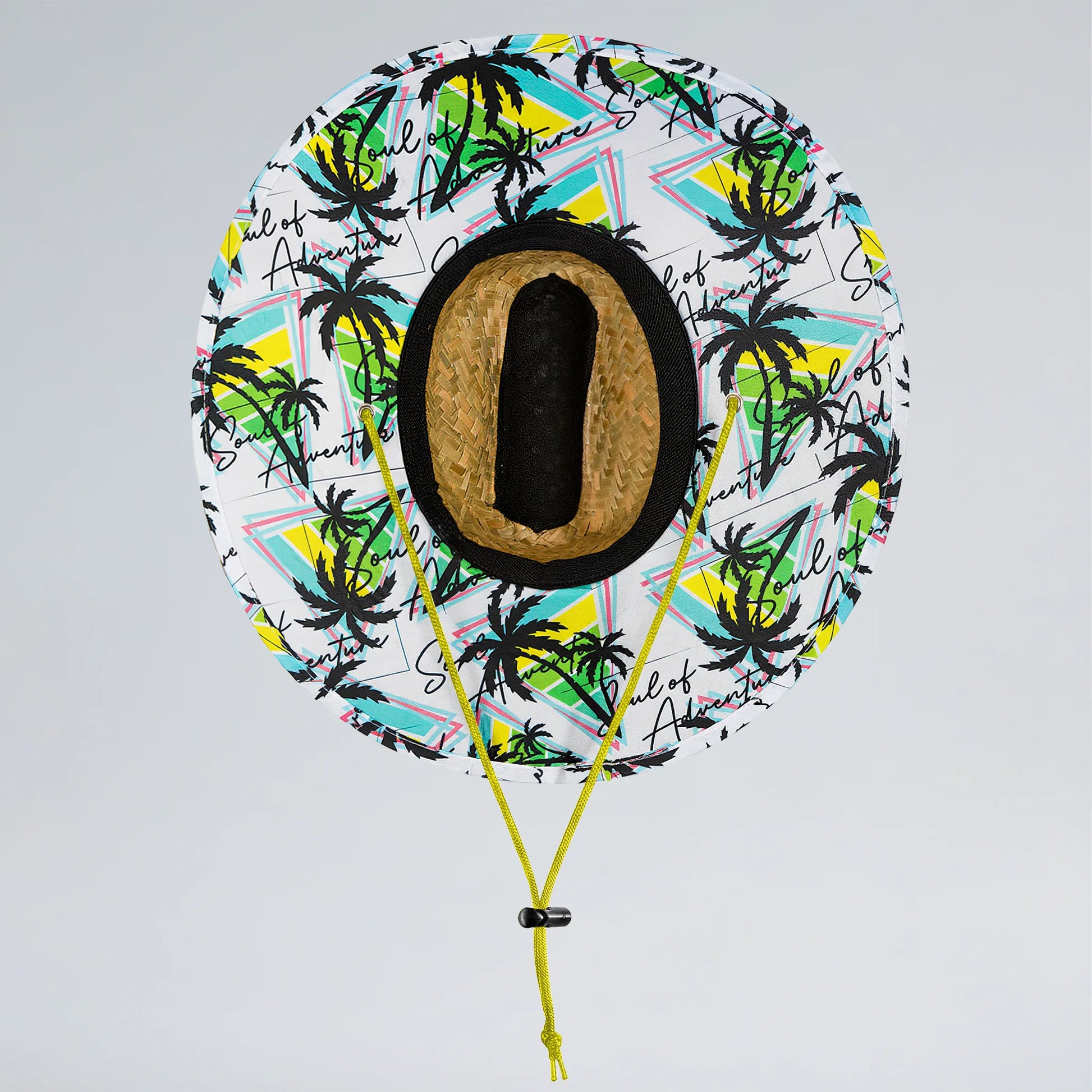 Decorative balloon with palm tree pattern and number '0' on a light gray background
