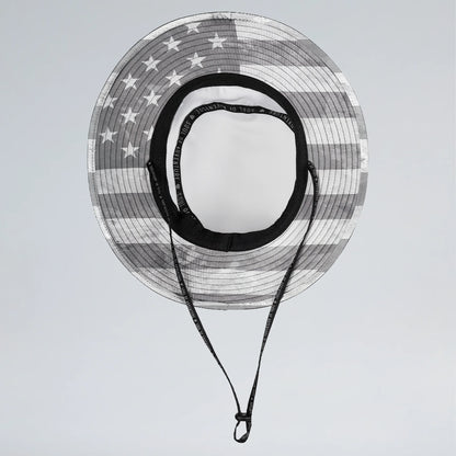 Sun hat with American flag pattern on a light gray background