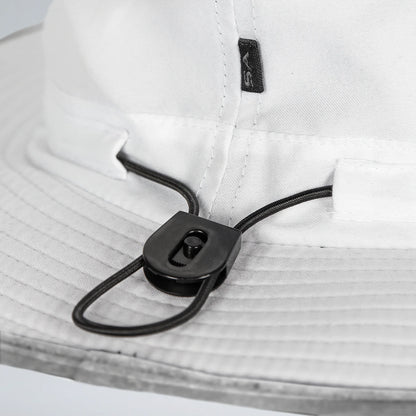 Close-up of a white shirt with a black cord and clip on a light gray background