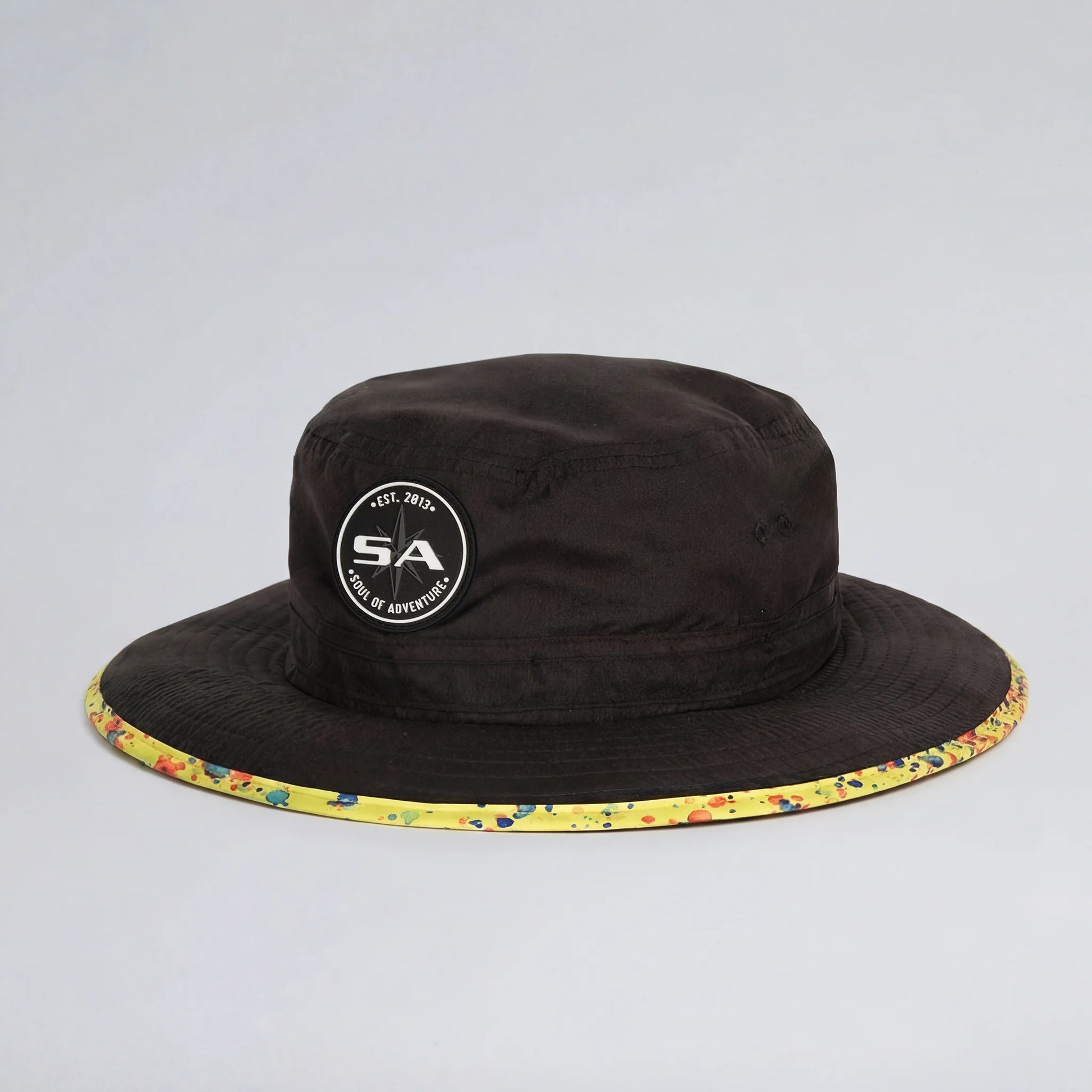 Black bucket hat with colorful rim and logo on a gray background