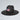 Black fedora hat with an American flag patch on a light gray background