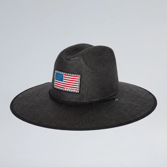 Black fedora hat with an American flag patch on a light gray background
