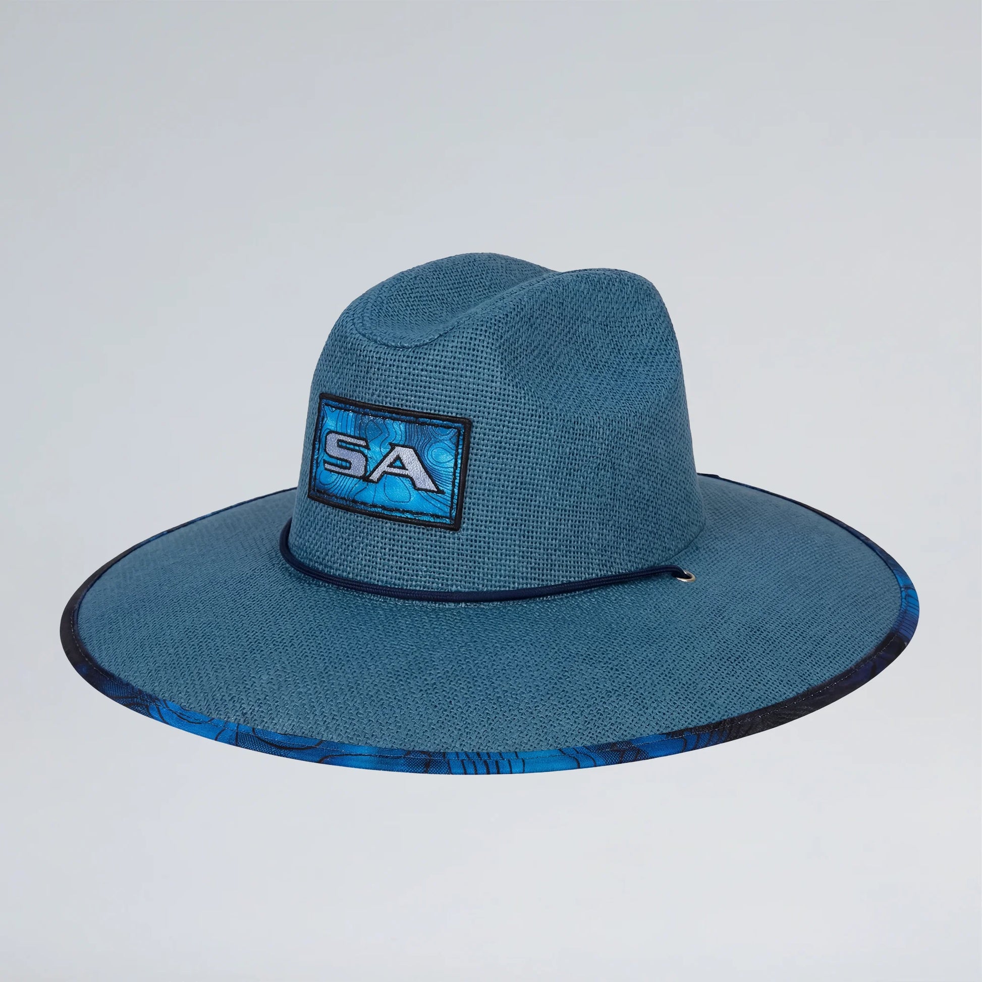 Blue wide-brimmed hat with a logo on a light gray background