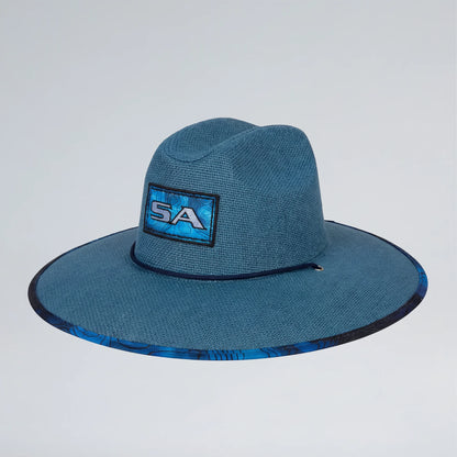 Blue wide-brimmed hat with a logo on a light gray background
