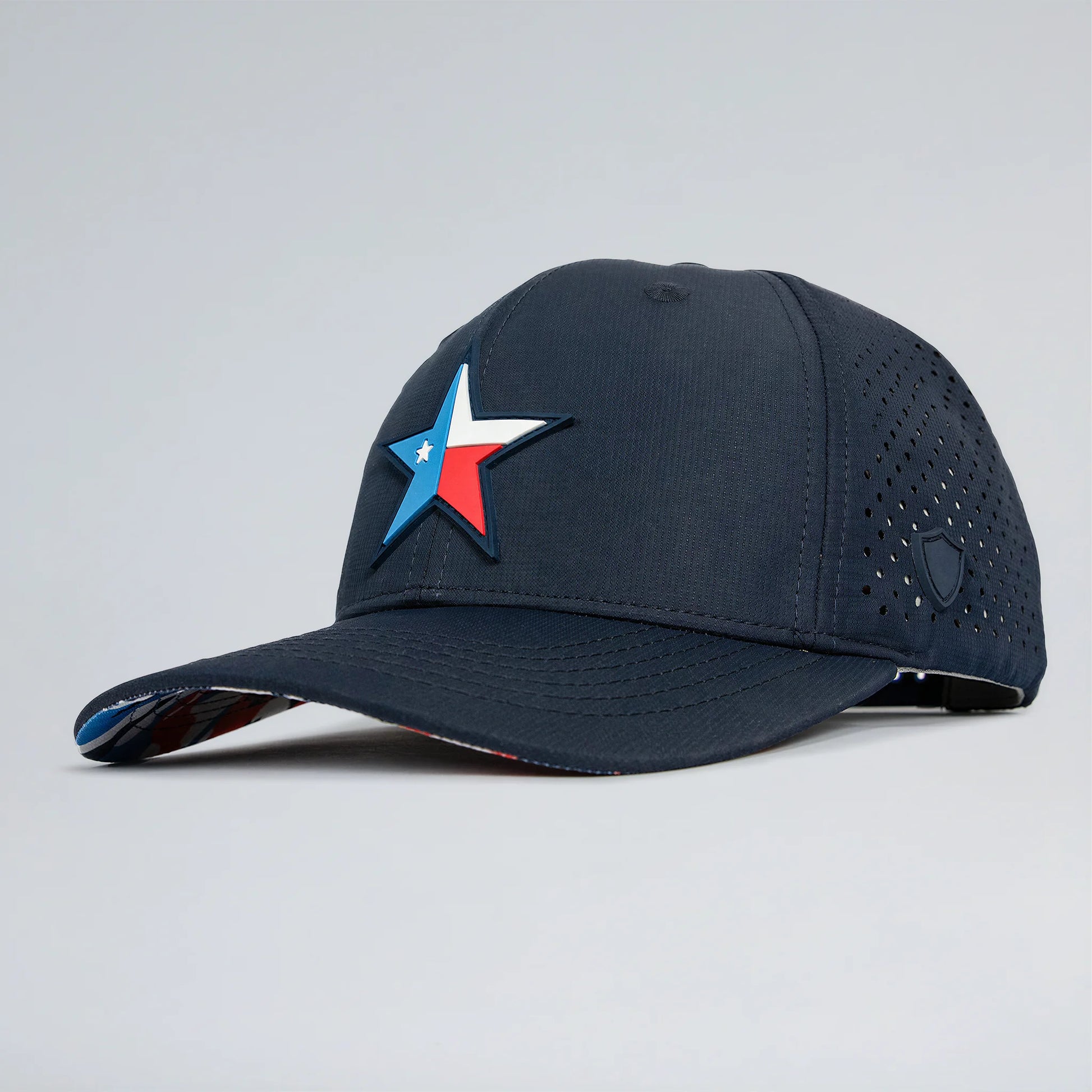 Navy blue cap with a star emblem on a light gray background