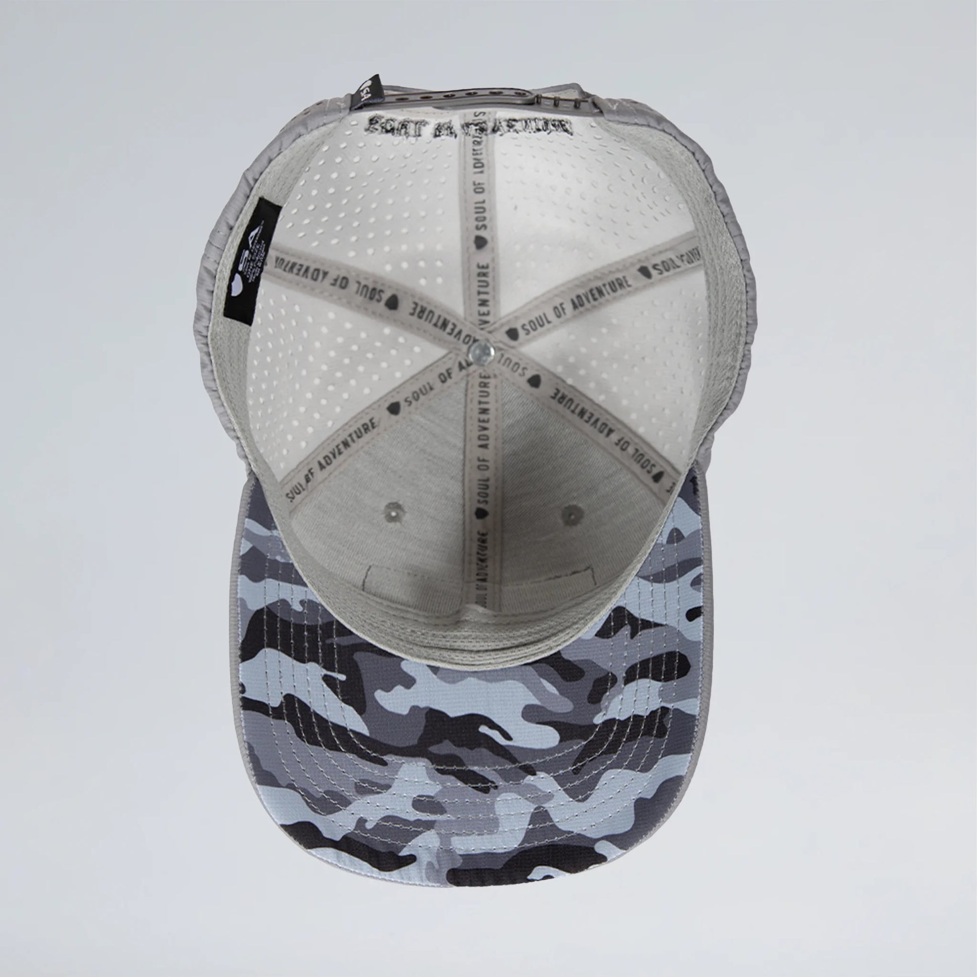 Cap with camouflage pattern on the front and gray interior on a white background