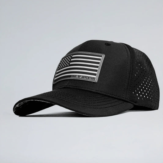 Black cap with American flag patch on a light gray background