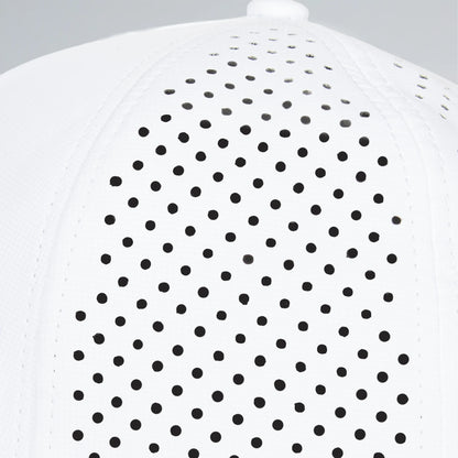 White shirt with black polka dot pattern on a light gray background