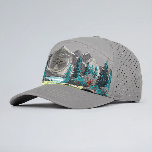 Gray cap with mountain and compass design on a light gray background