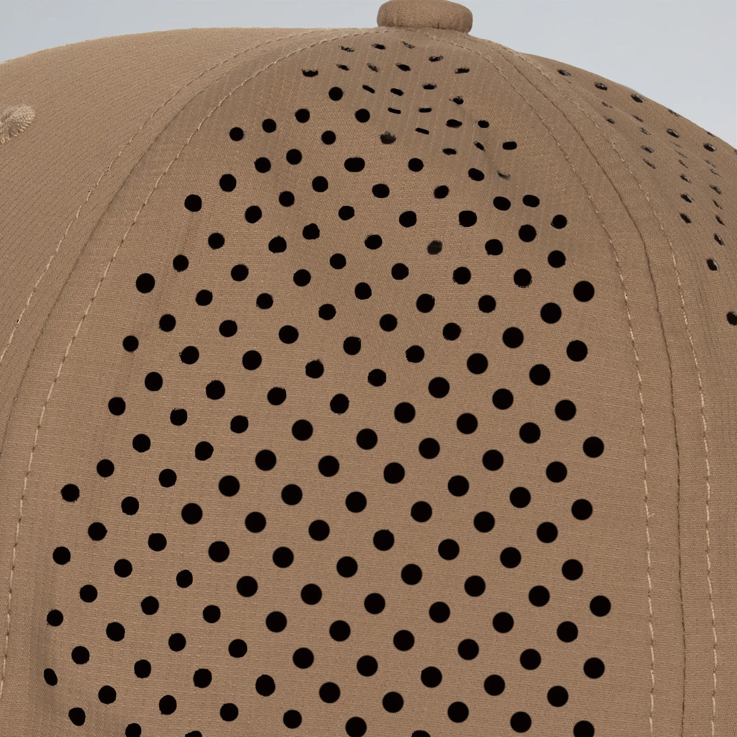 Brown cap with a pattern of small holes on the back against a light gray background