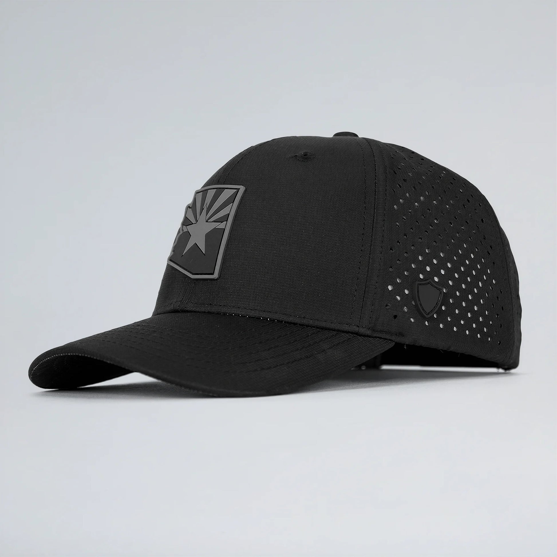 Black cap with a star emblem on a light gray background