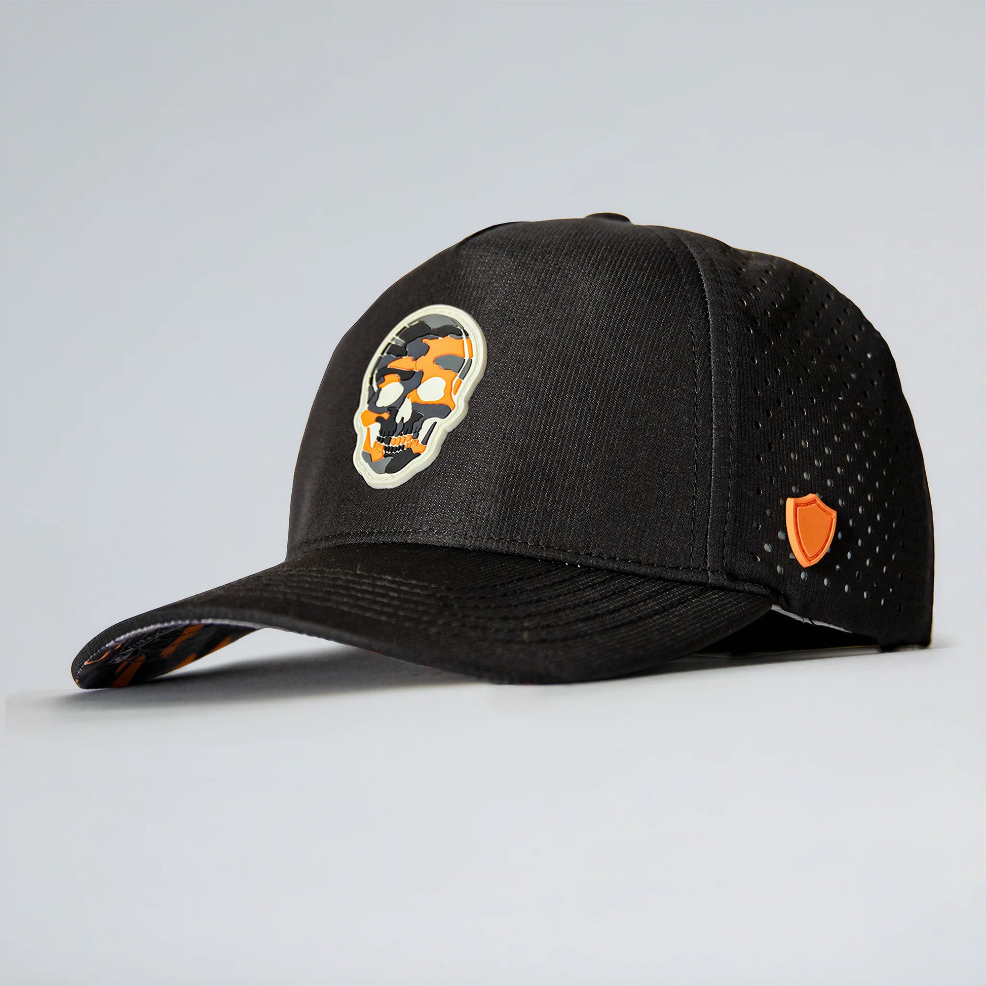 Black cap with a logo on a light gray background