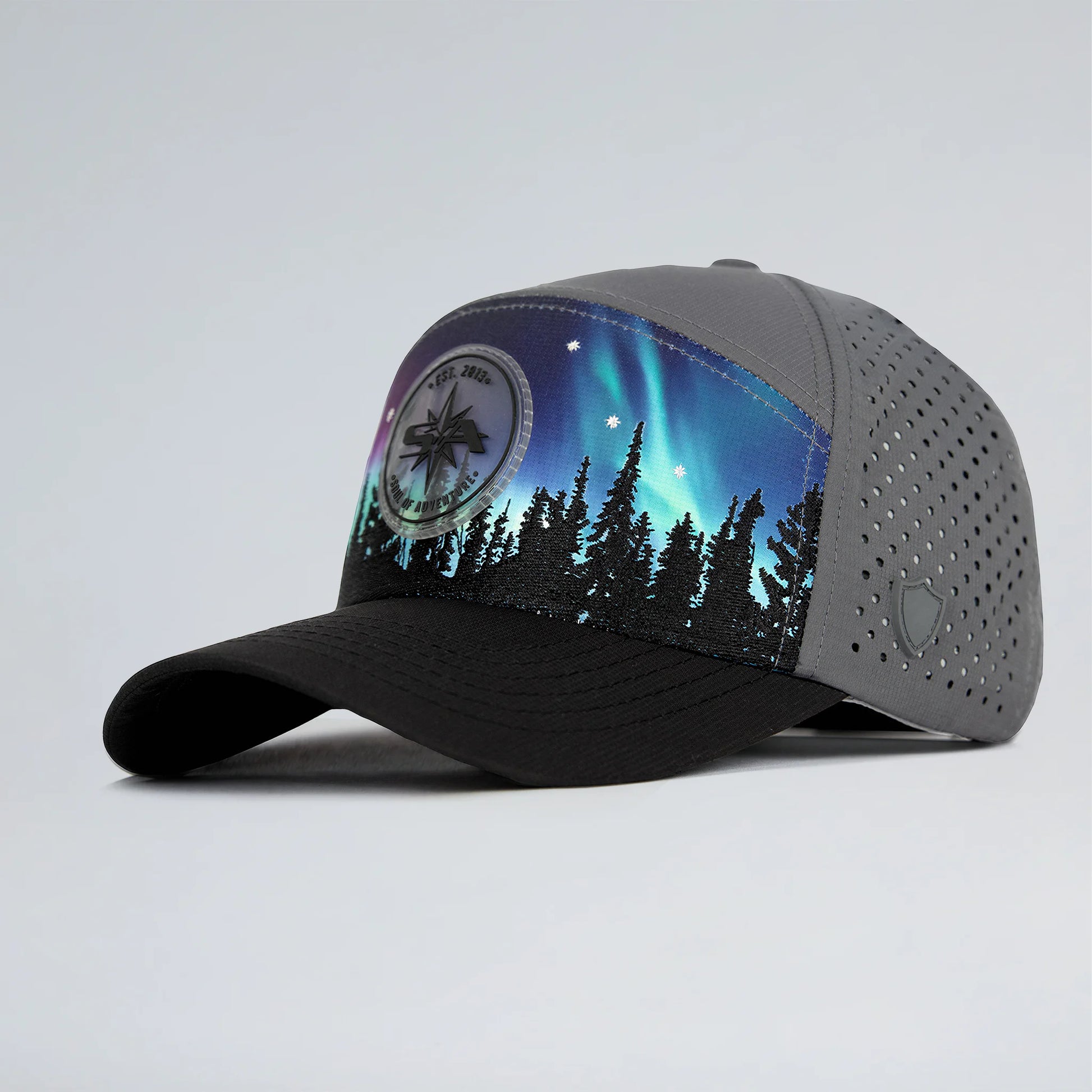 Cap with Northern Lights design on a gray background