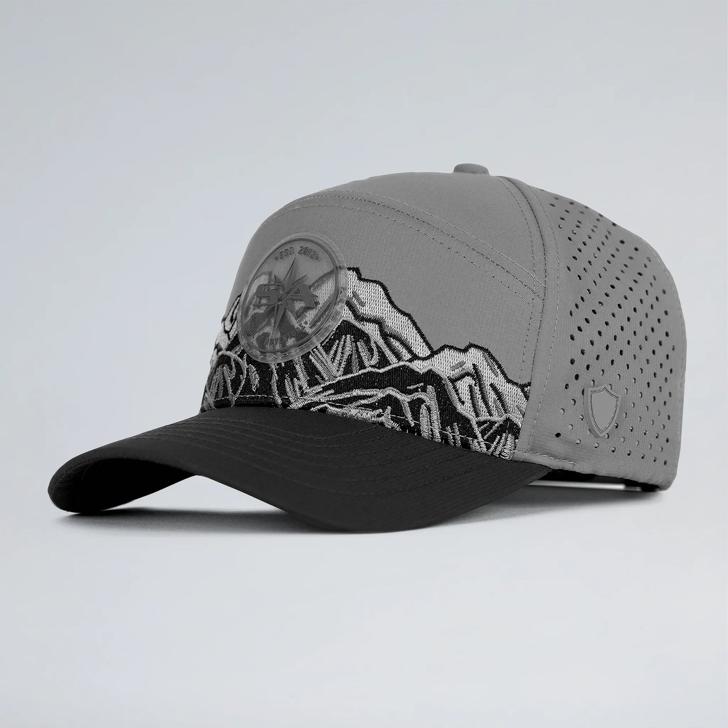 Gray cap with mountain design on a light gray background