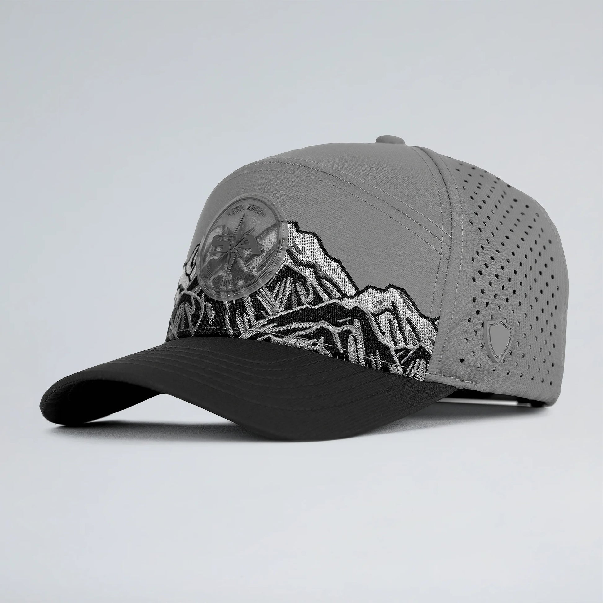 Gray cap with mountain design on a light gray background