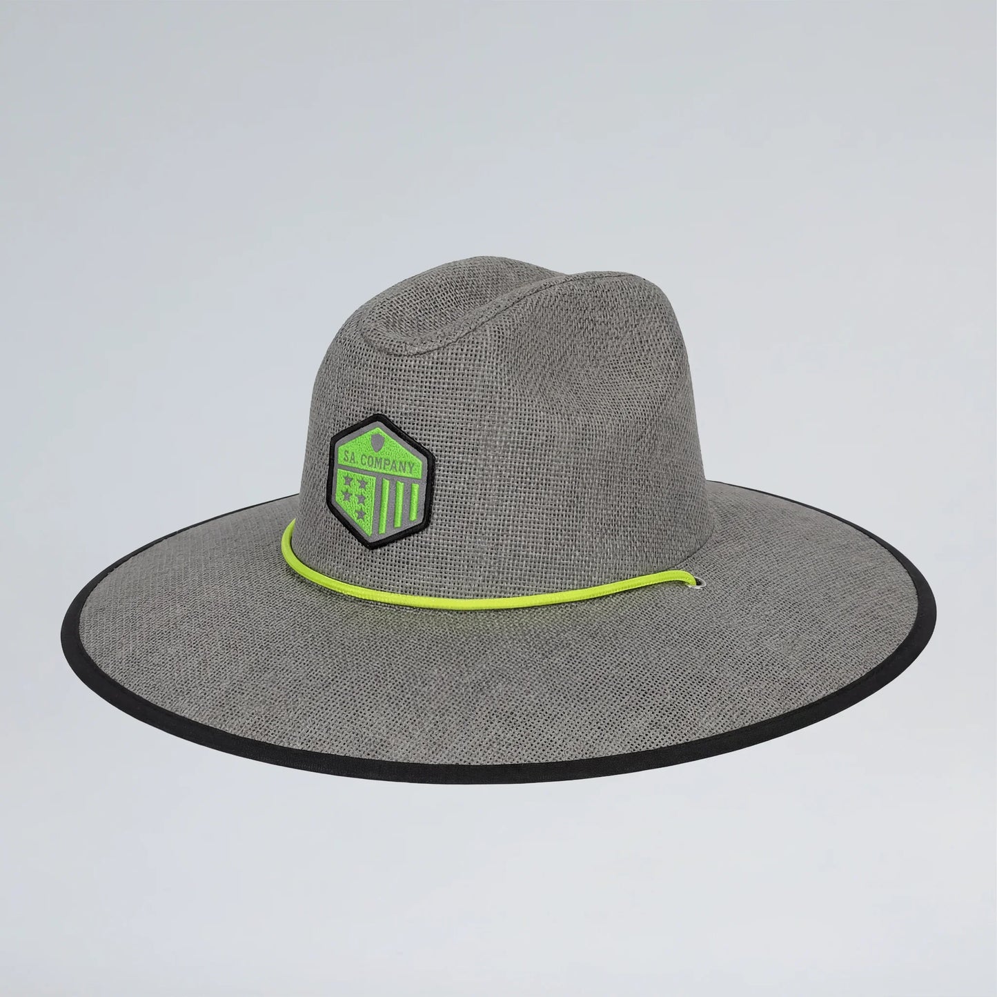 Gray wide-brimmed hat with a green logo on a light gray background