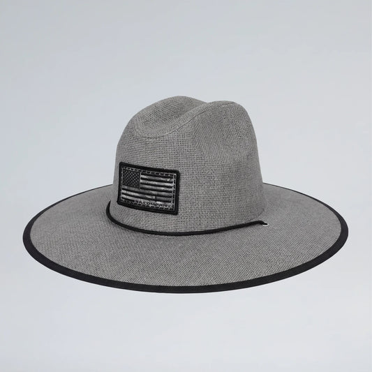 Gray wide-brimmed hat with an American flag patch on a light gray background
