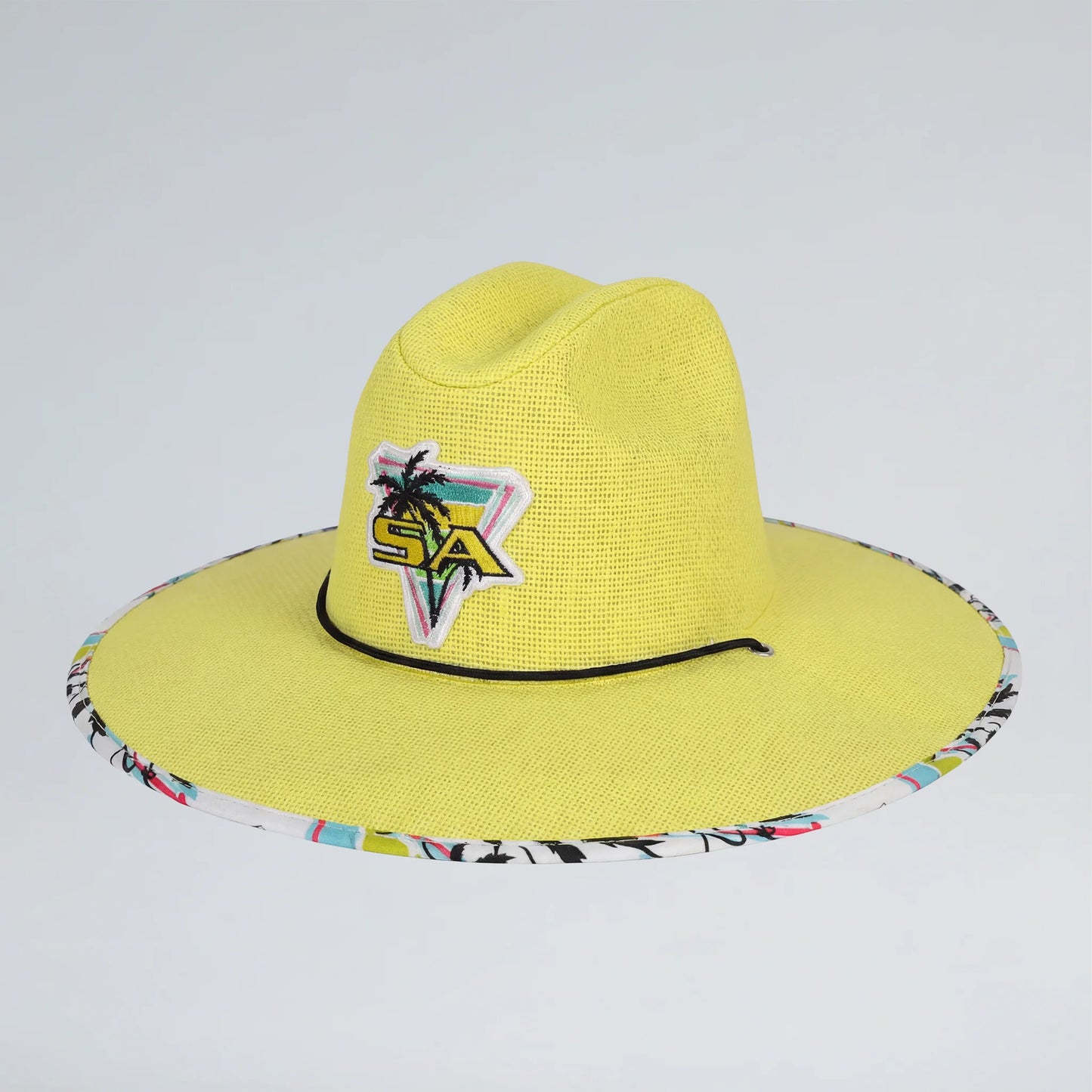 Yellow straw hat with colorful band and logo on a light gray background