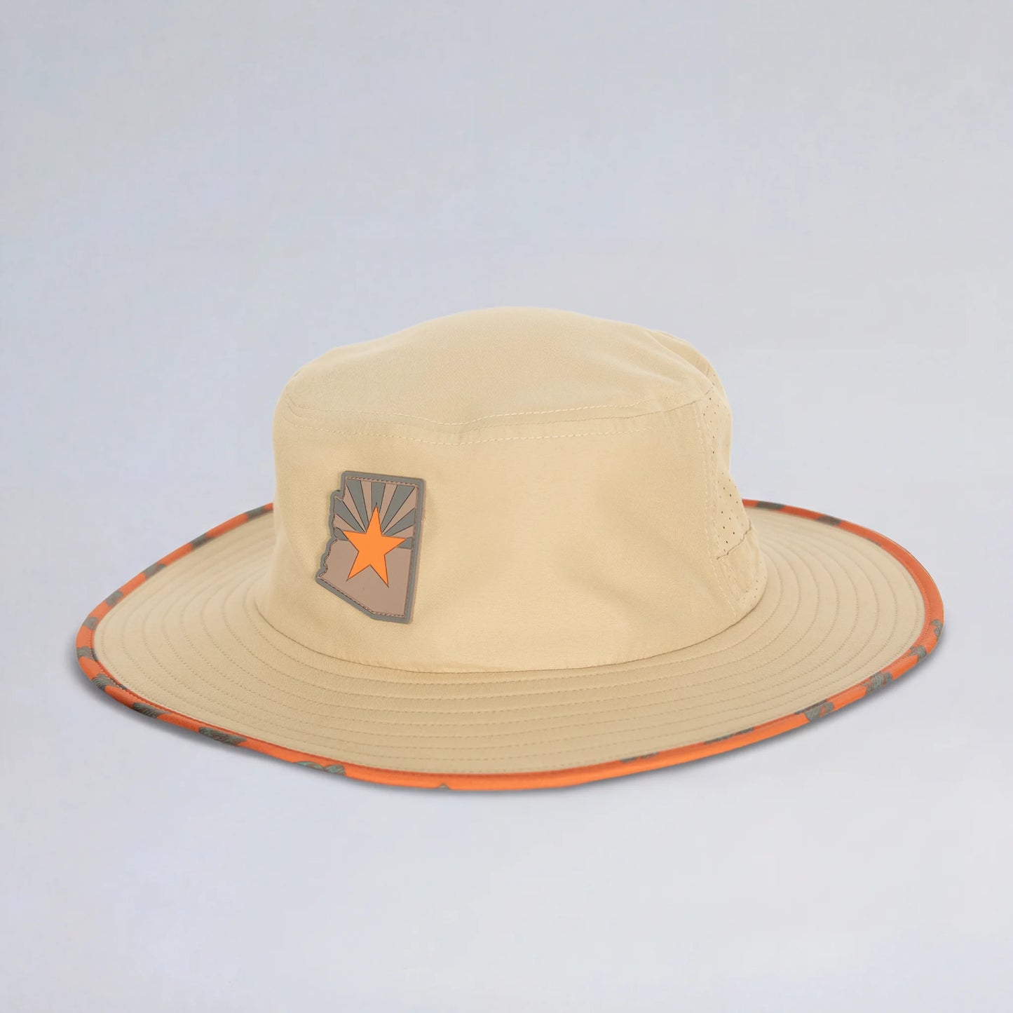 yellow bucket hat with orange trim wth orange and grey patch on the front