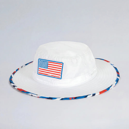 white bucket hat with blue red and white on the trim with an american flag patch on the front