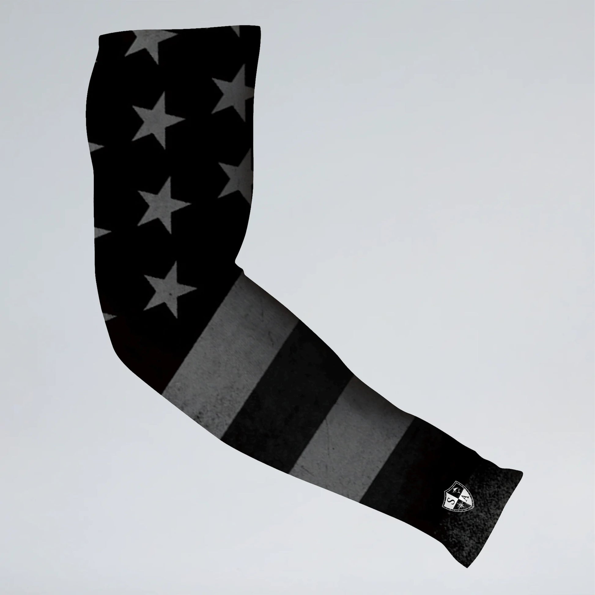 Black and gray arm sleeve with star pattern on a light gray background