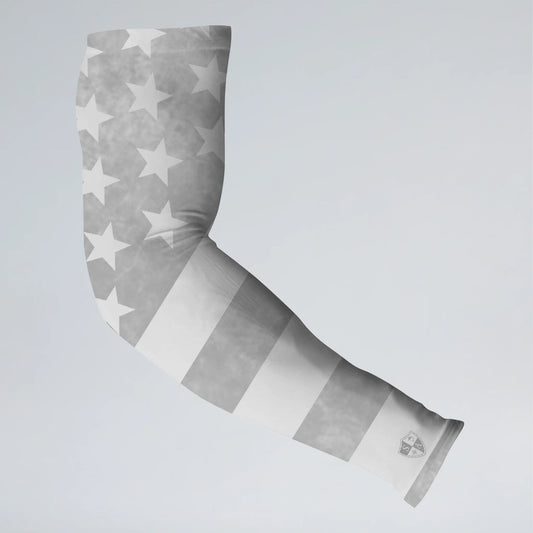 Gray and white patterned arm sleeve on a light gray background
