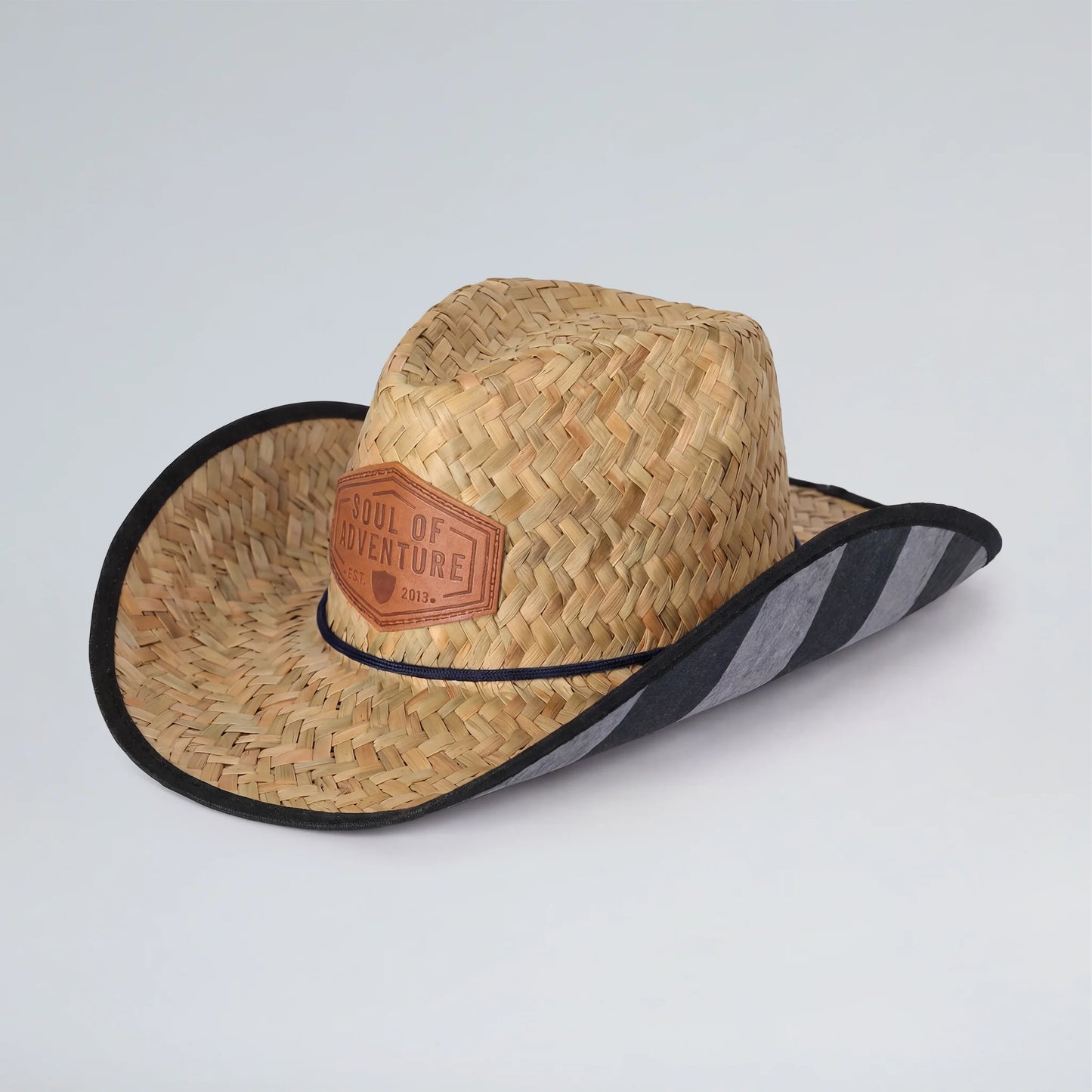 Straw hat with a band and logo on a light gray background