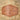 Brown leather patch with 'Soul of Adventure' text on a woven background
