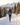 Woman trail running on a snowy mountain path
